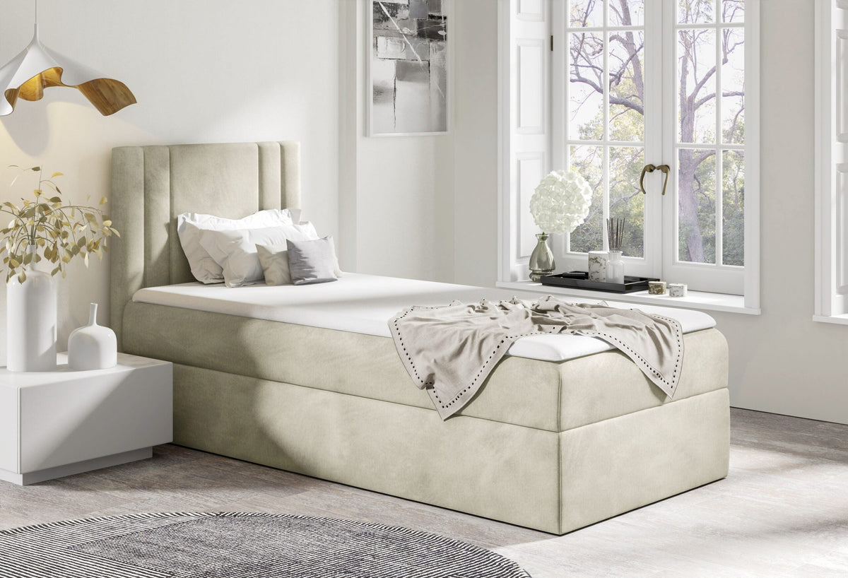 Lineo mini bed with a bedding storage compartment – Monolith 02 – front view – image 1