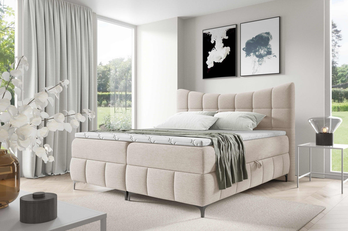 Orivo continental bed with a bedding storage compartment – Aragon 01 – front view – image 1