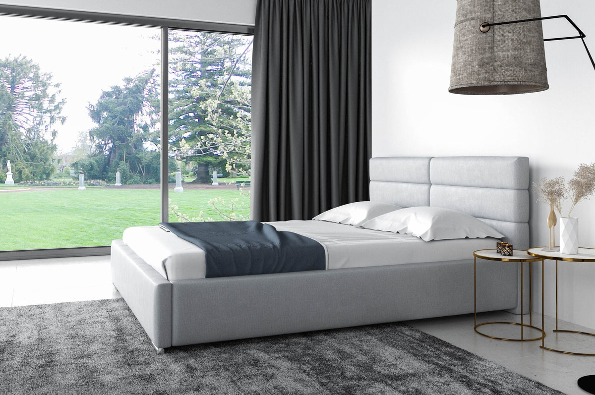 Belluno upholstered bed with a bedding storage compartment – Monolith 84 – front view – image 1